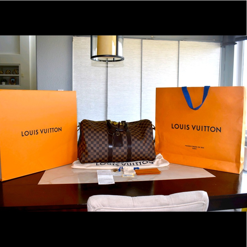 LOUIS VUITTON Keep .45 BA.D.EBE. Travel bag